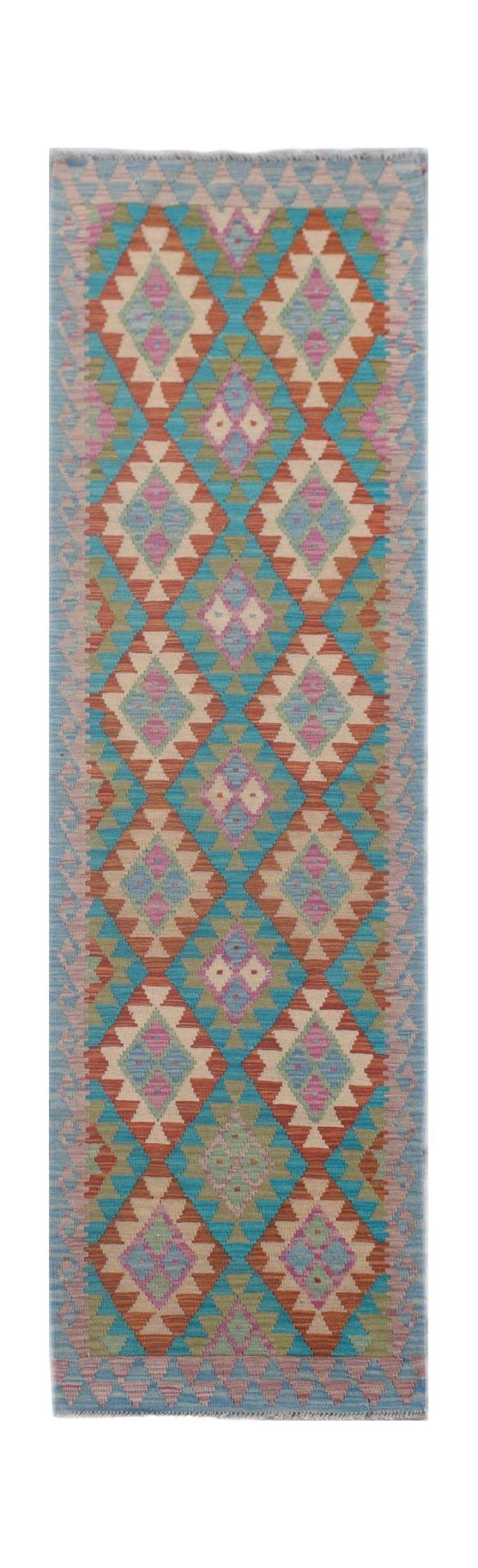 Handmade Afghan Maimana wool runner rug featuring a colorful geometric diamond pattern.