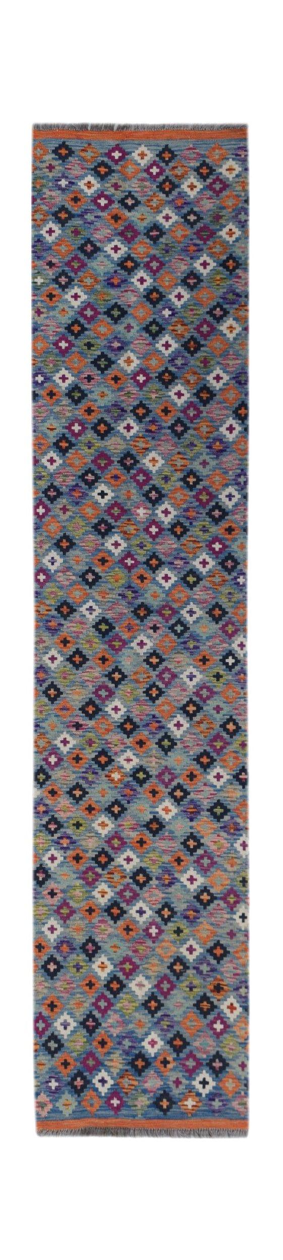 Handwoven Afghan Maimana wool runner rug featuring a colorful geometric diamond pattern.