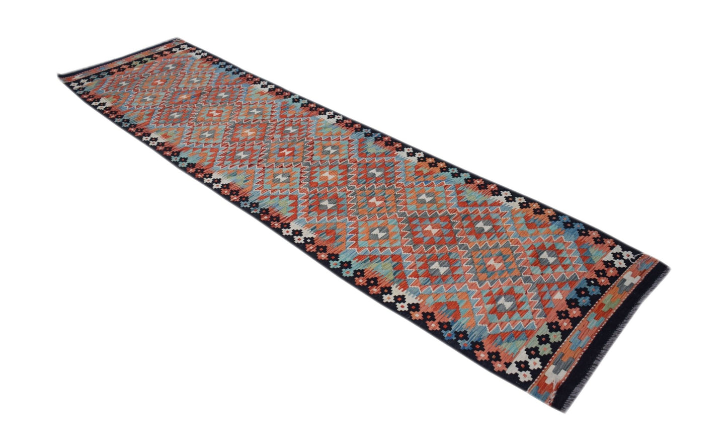 A handmade Afghan Maimana wool runner rug featuring a geometric diamond pattern in vibrant colors.