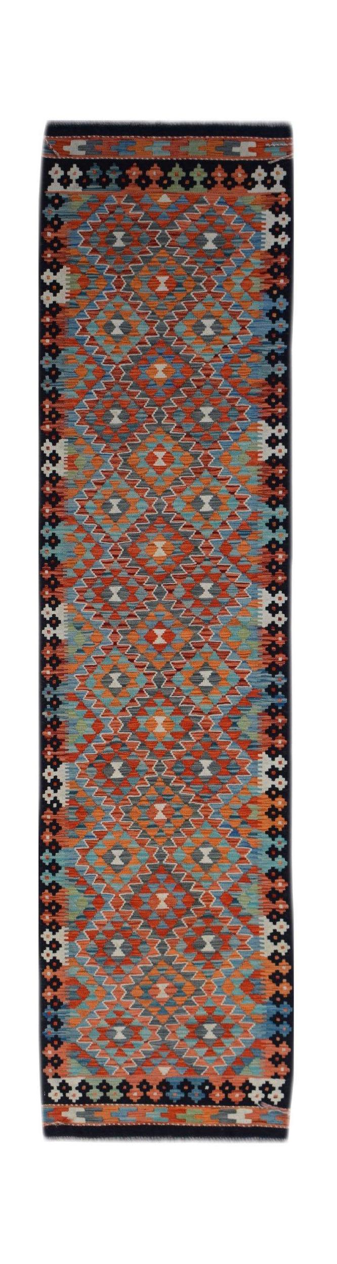 Handwoven Afghan Maimana wool runner featuring a colorful geometric diamond pattern.