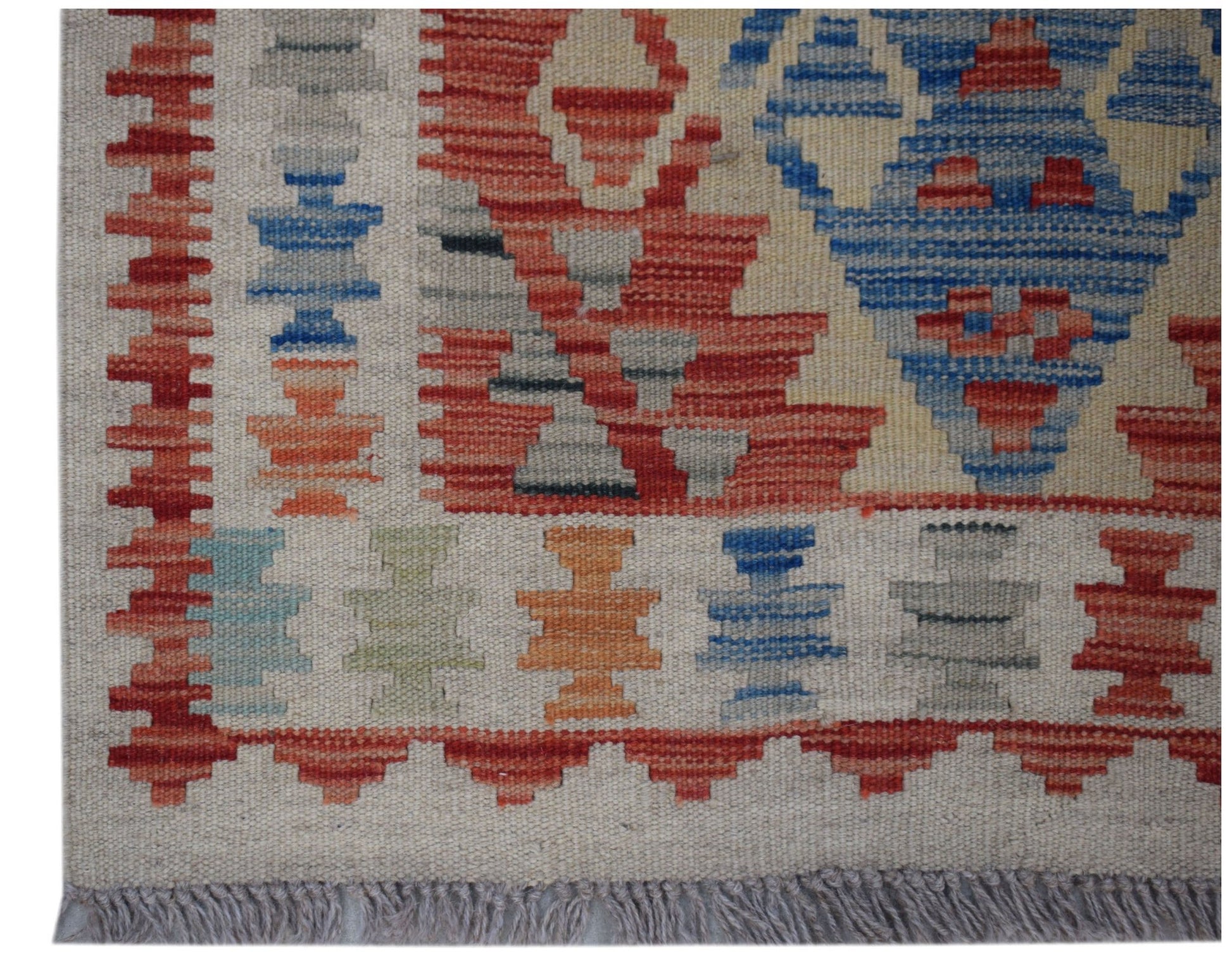 Handwoven Afghan Maimana wool kilim runner featuring geometric patterns in red, blue, and grey.