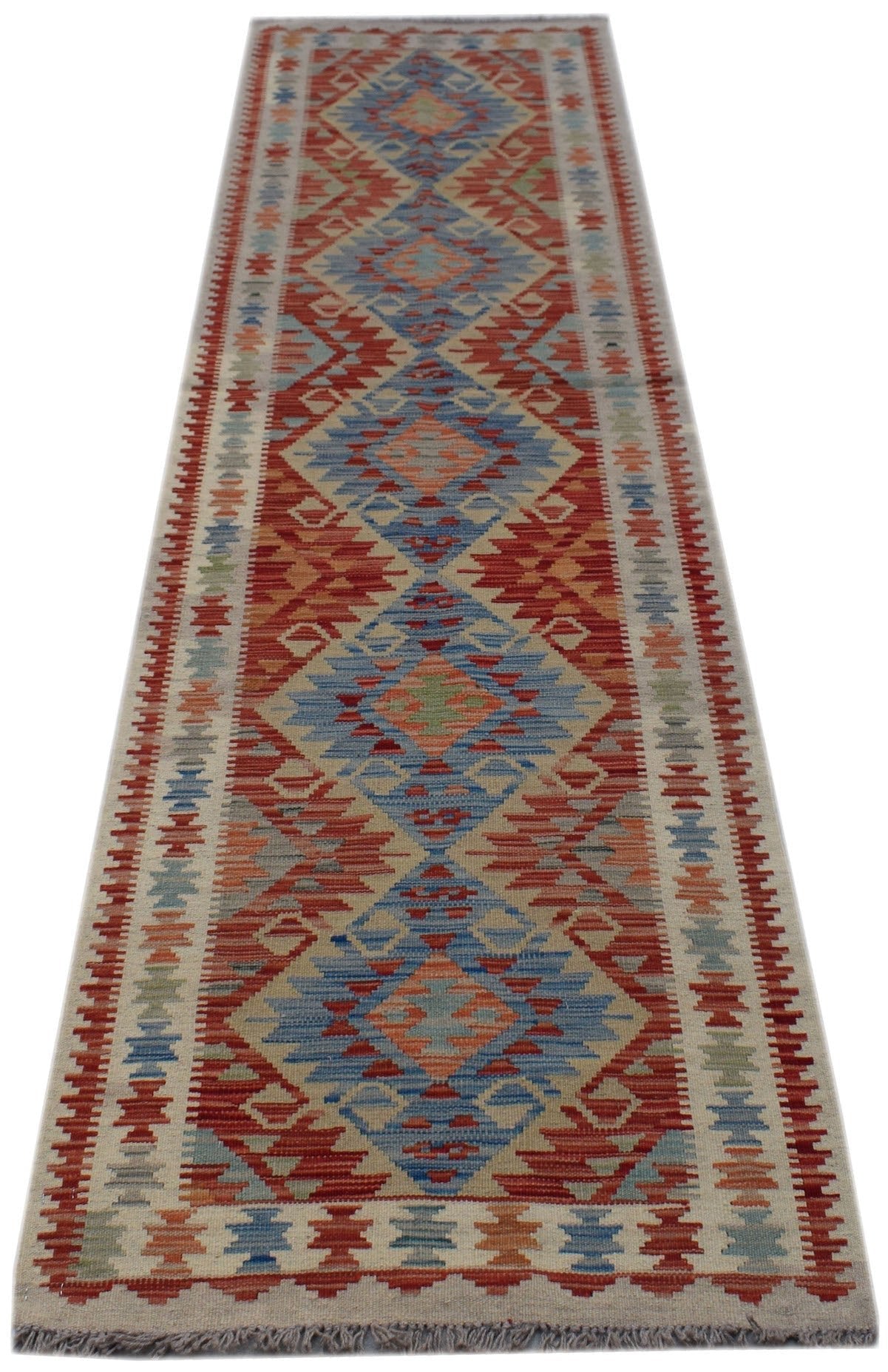 Handwoven Afghan Maimana wool runner rug featuring a geometric diamond pattern in red and blue.