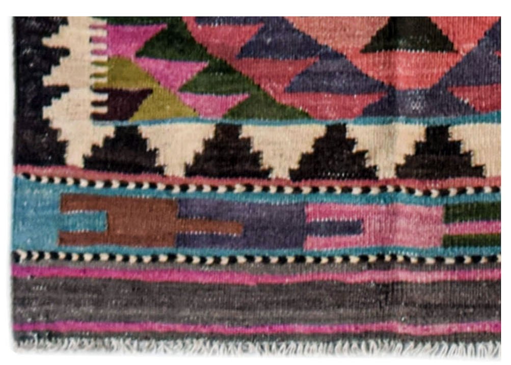 Afghan Maimana Kilim Runner with geometric patterns in pink, green, blue, and brown.