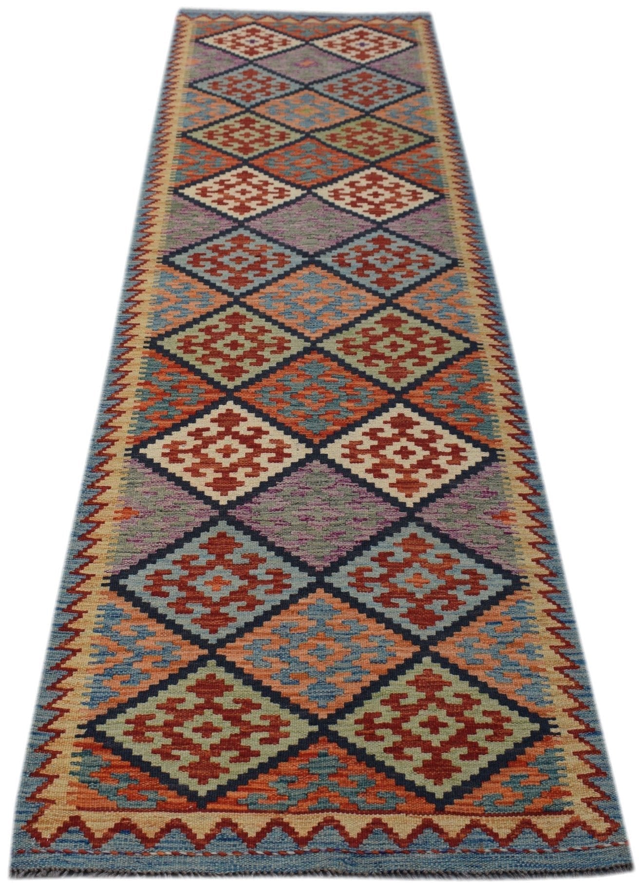 Handwoven Afghan Maimana wool runner featuring a colorful geometric diamond pattern.
