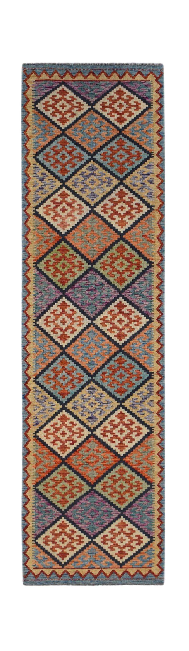 Handwoven Afghan Maimana wool runner rug featuring a colorful geometric diamond pattern.