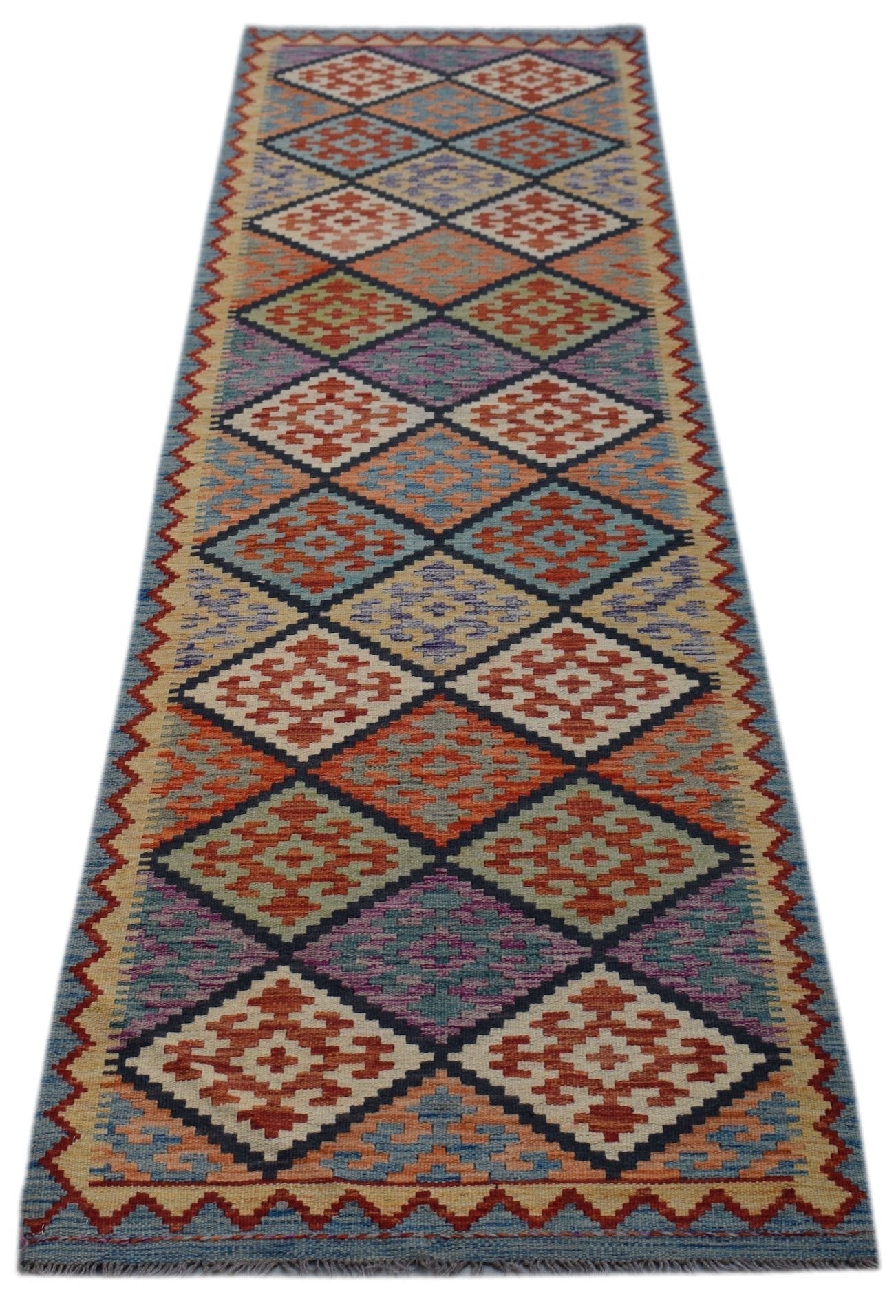 Handwoven Afghan Maimana wool runner rug featuring a colorful geometric diamond pattern.