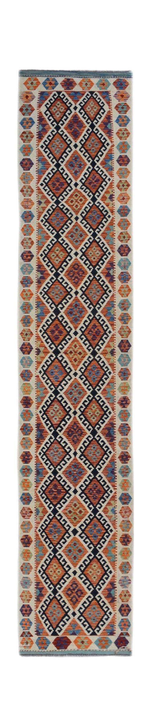 Handwoven Afghan Maimana wool runner featuring a repeating diamond pattern in vibrant colors.