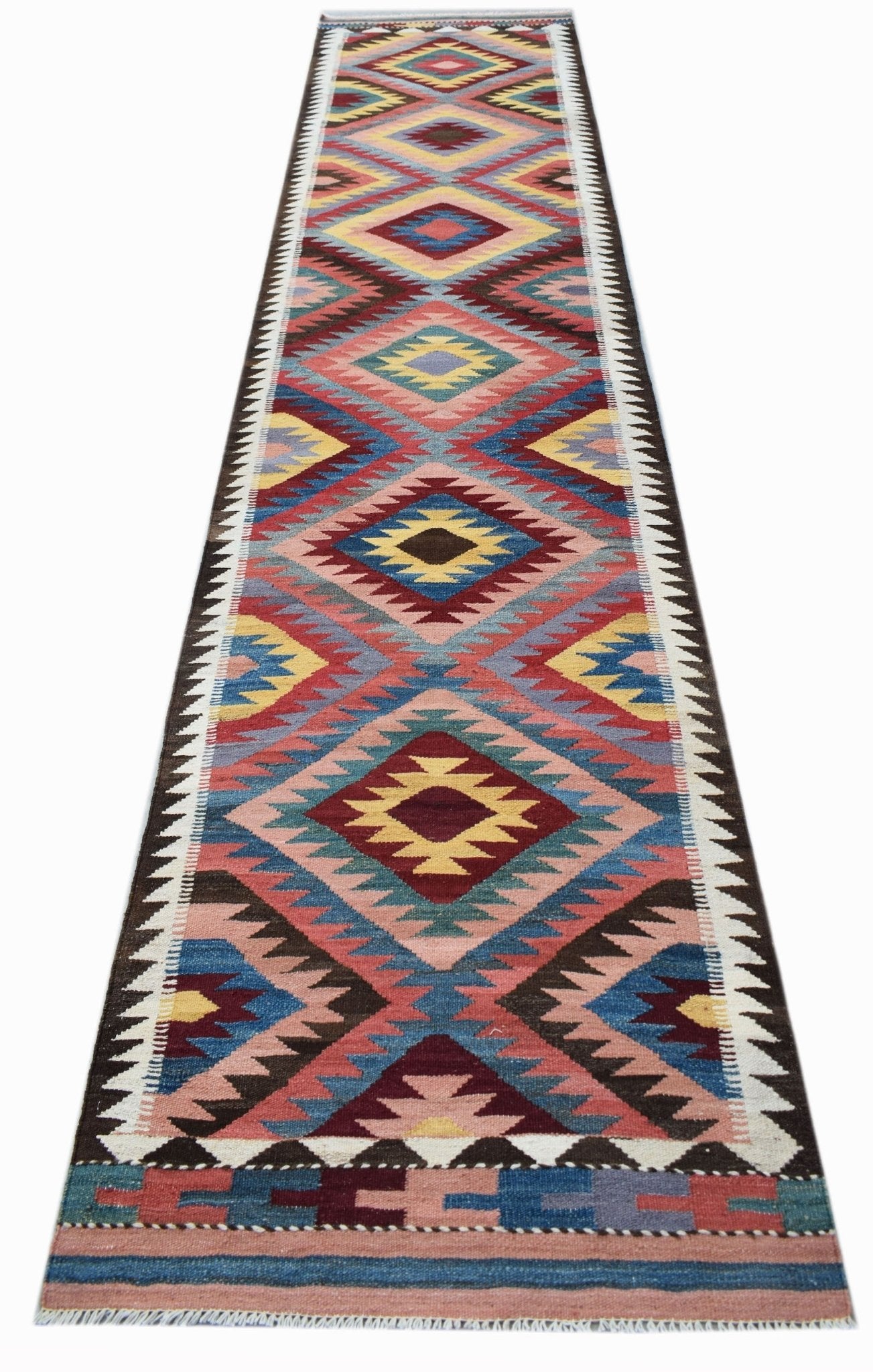 Handwoven Afghan Maimana wool runner featuring a colorful geometric diamond pattern.
