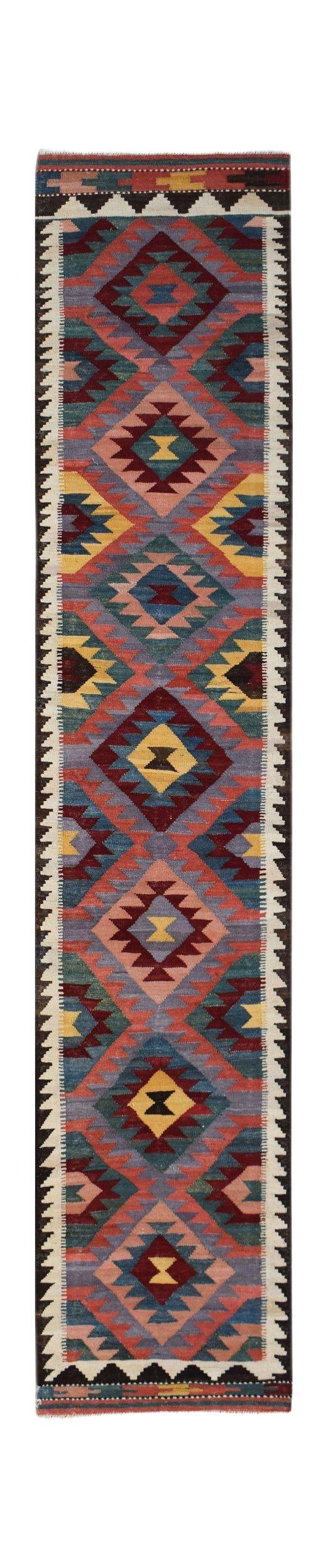 Handwoven Afghan Maimana wool runner rug featuring a colorful geometric diamond pattern.