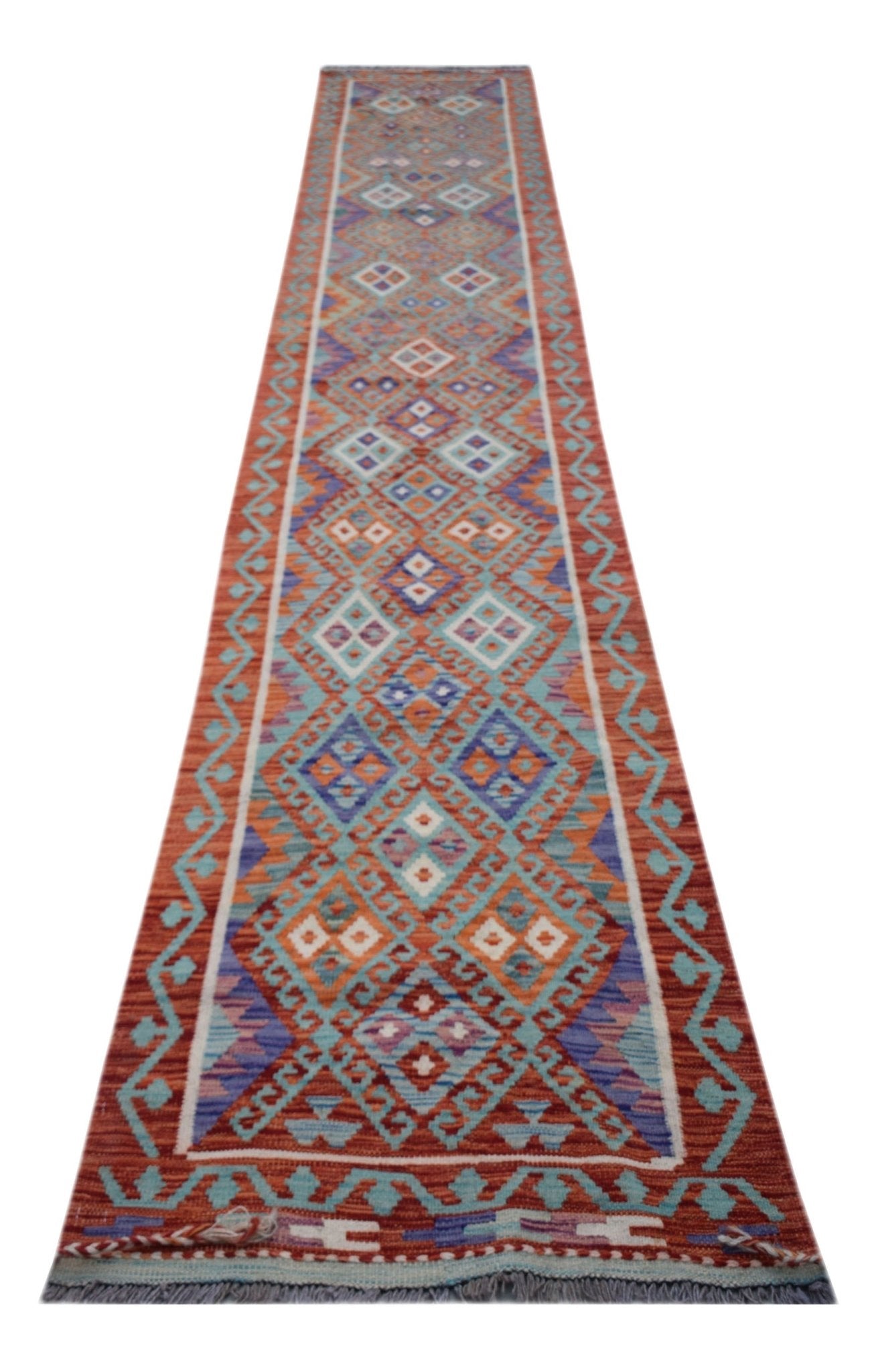 Handwoven Afghan Maimana wool runner rug featuring a geometric pattern in vibrant colors.