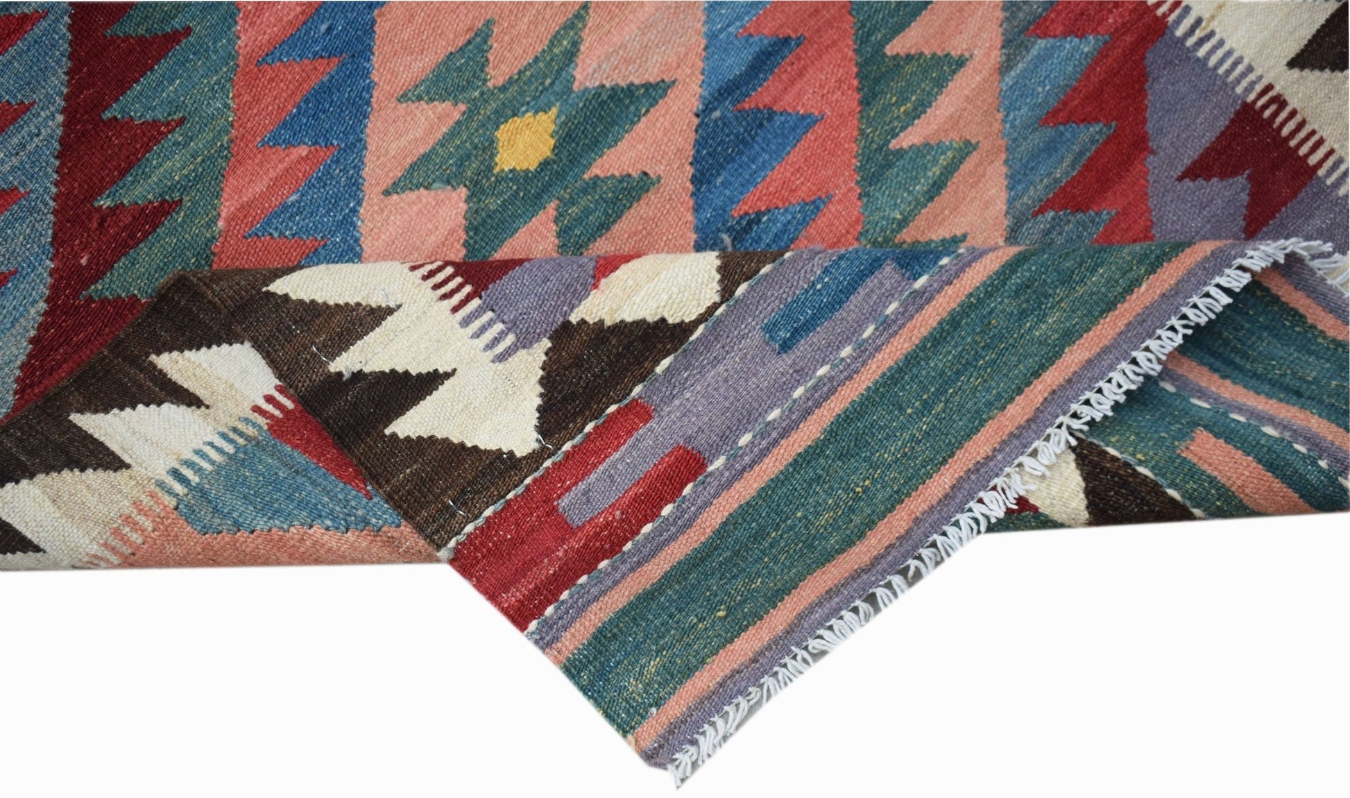 A handmade Afghan Maimana wool kilim runner featuring geometric patterns in vibrant colors.