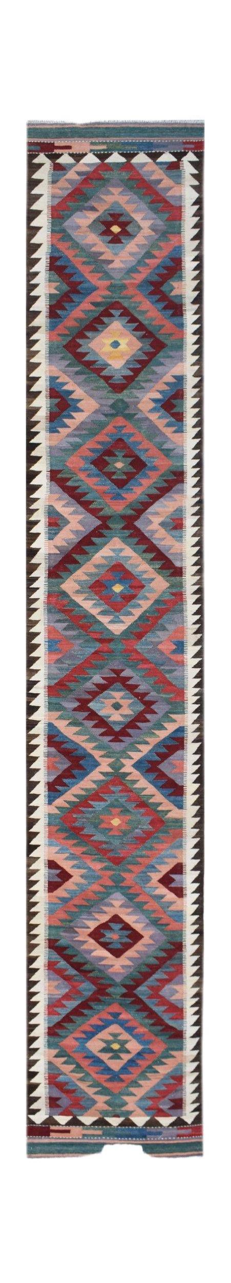Handwoven Afghan Maimana wool runner rug featuring a colorful geometric diamond pattern.