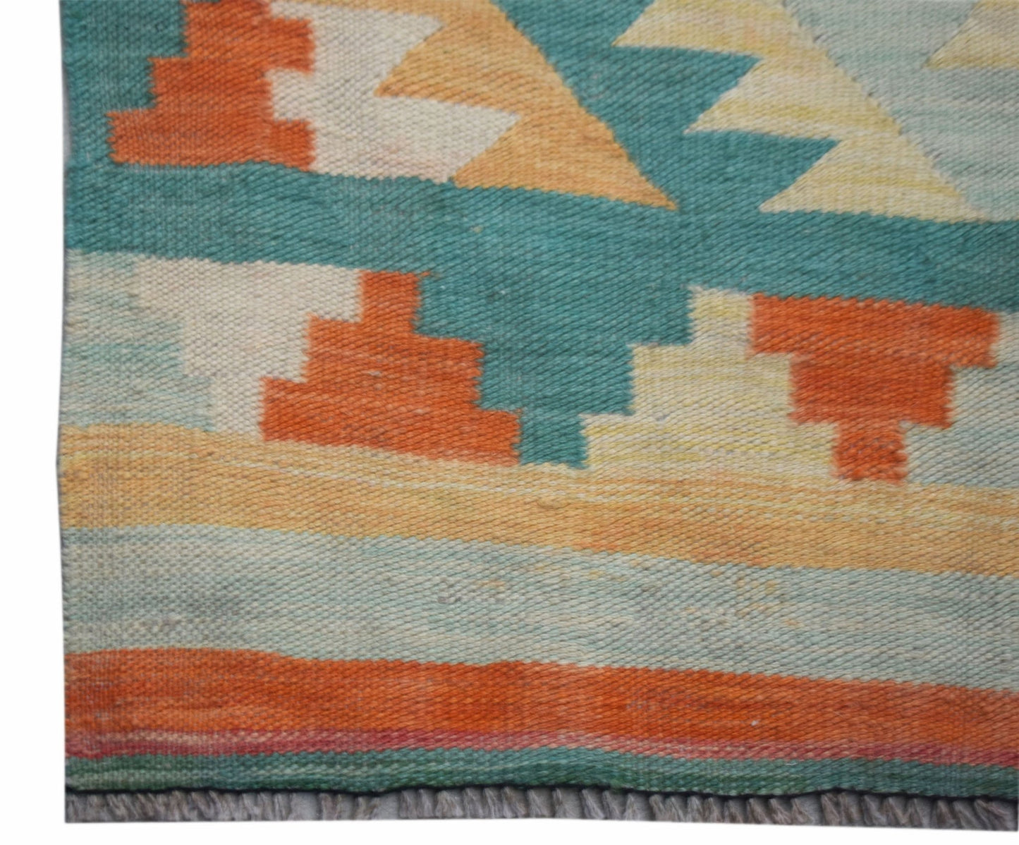 Handwoven Afghan Maimana wool kilim runner featuring a geometric pattern in orange and teal.