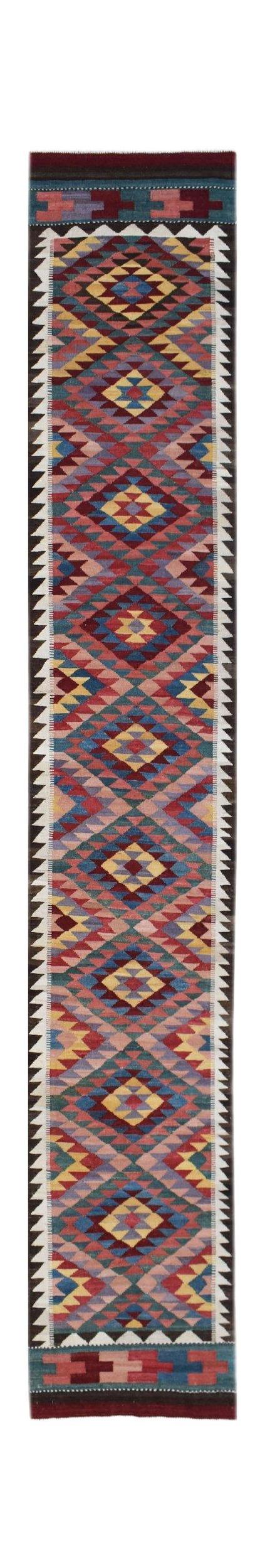Handwoven Afghan Maimana wool runner rug featuring a colorful geometric diamond pattern.