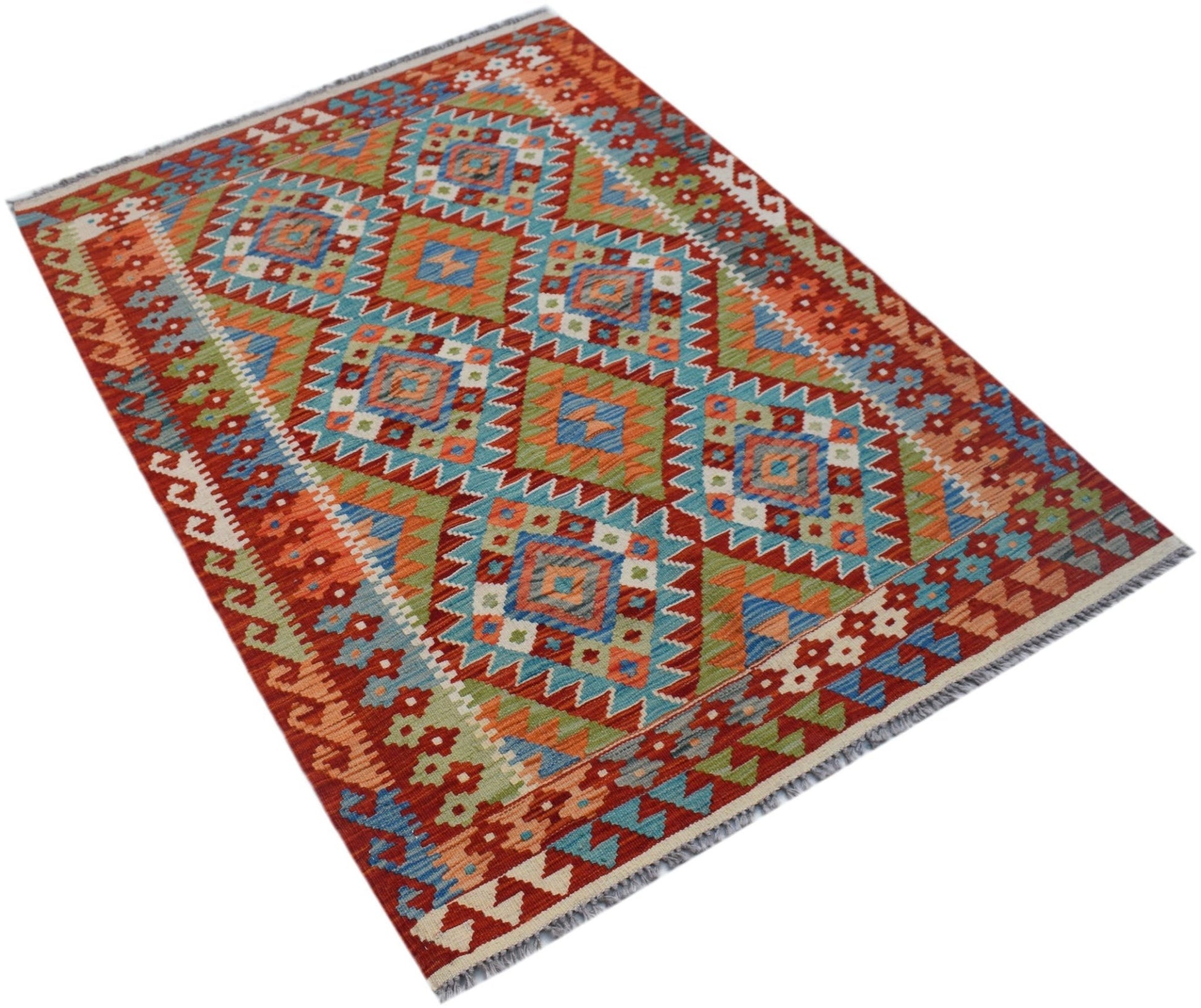 Handwoven Afghan Maimana kilim rug featuring a vibrant geometric diamond pattern in wool.