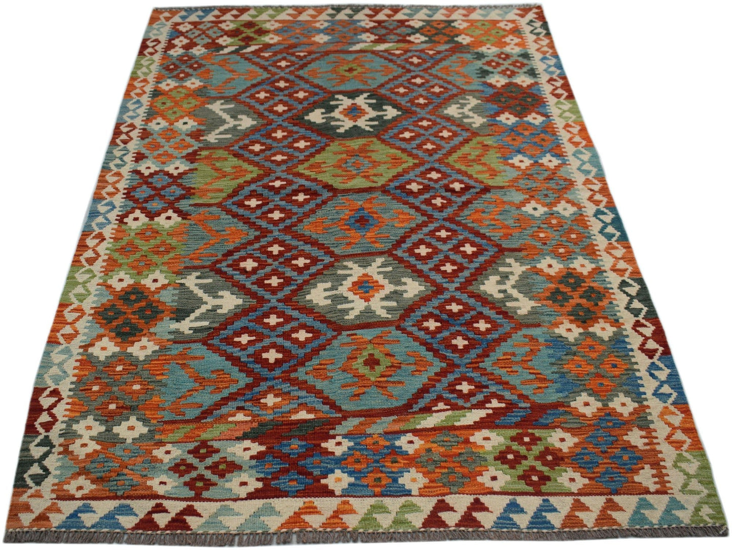 Handwoven Afghan Maimana kilim rug featuring a colorful geometric diamond pattern in wool.
