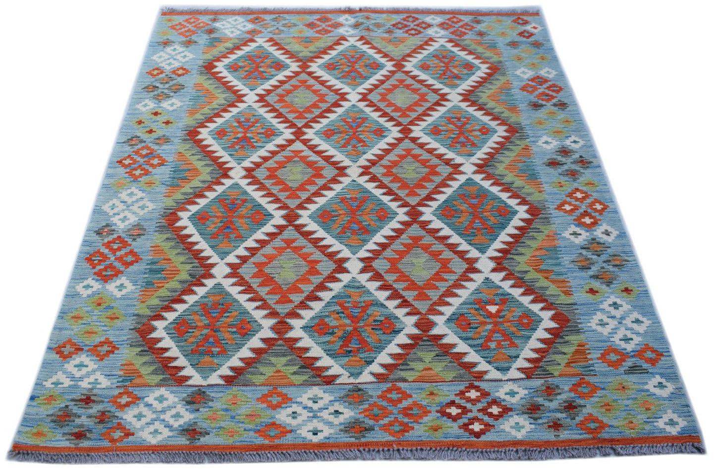 Handwoven Afghan Maimana kilim rug featuring a blue background with a geometric diamond pattern.
