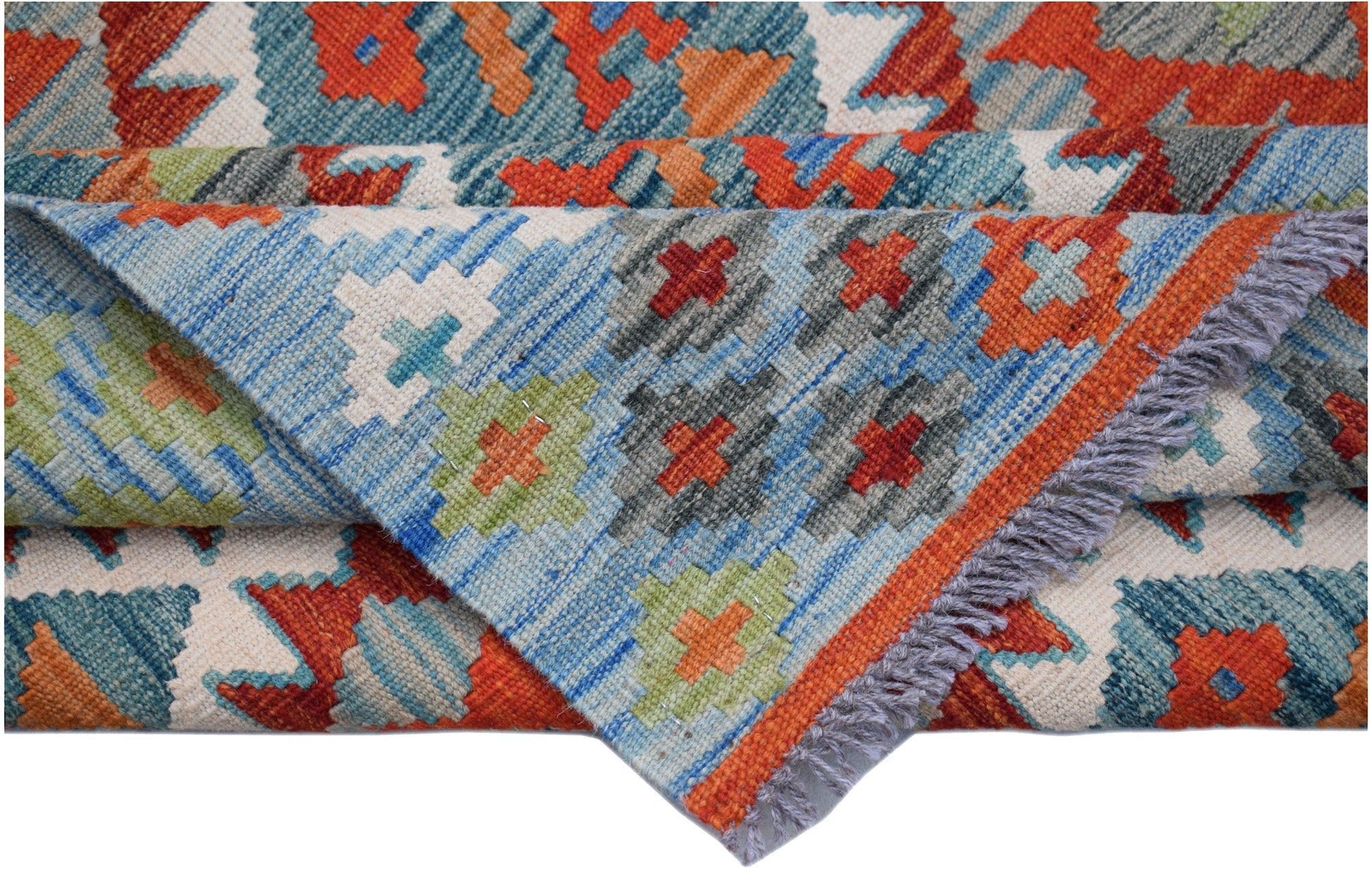 A handwoven Afghan Maimana kilim rug featuring a geometric pattern in vibrant orange and blue.