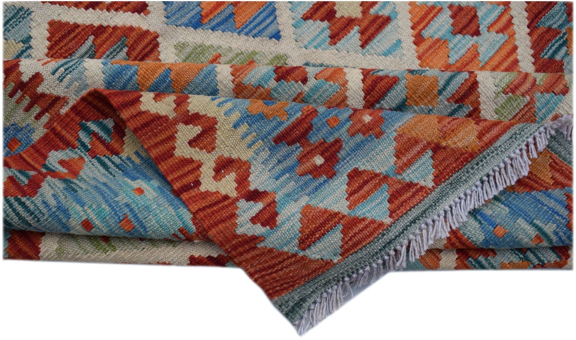 A handwoven Afghan Maimana kilim rug featuring a geometric pattern in vibrant orange and blue.