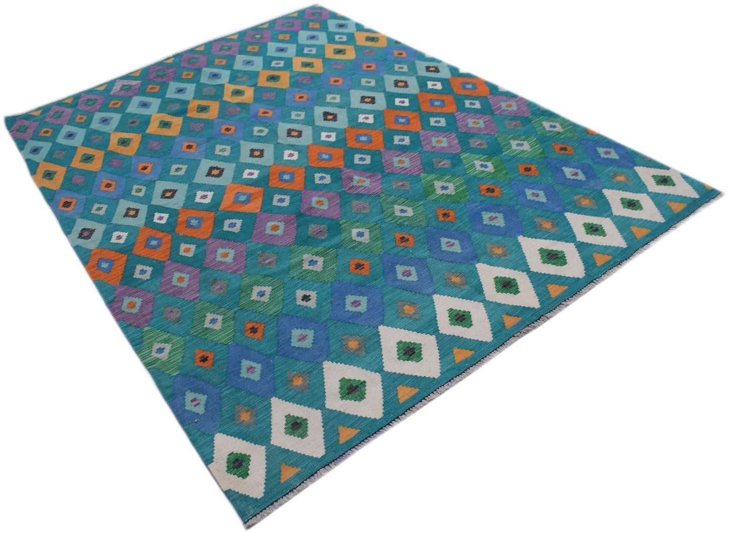 Handmade Afghan Maimana kilim rug featuring a colorful geometric diamond pattern in wool.