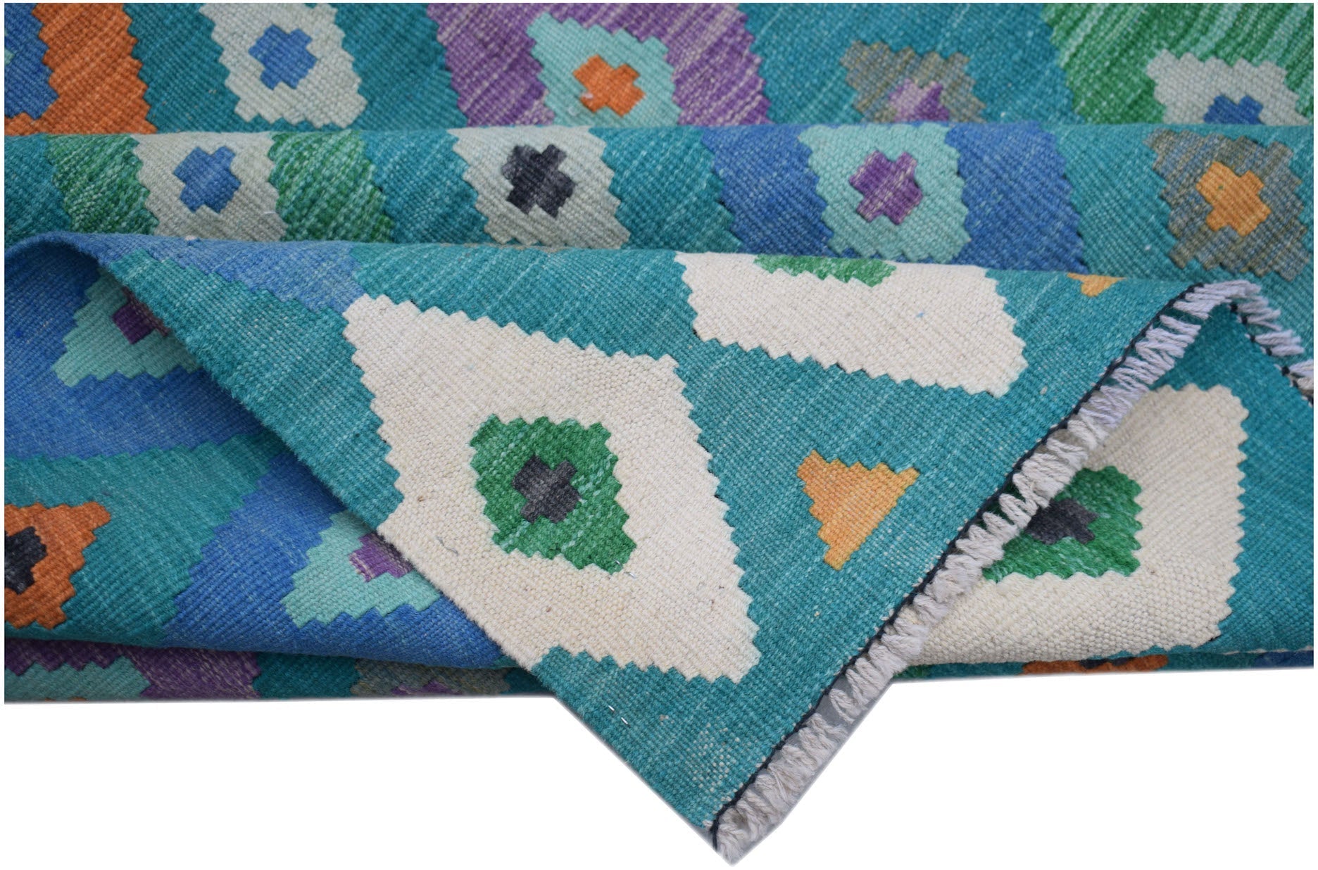 A handmade Afghan Maimana kilim rug featuring a vibrant geometric pattern in wool.