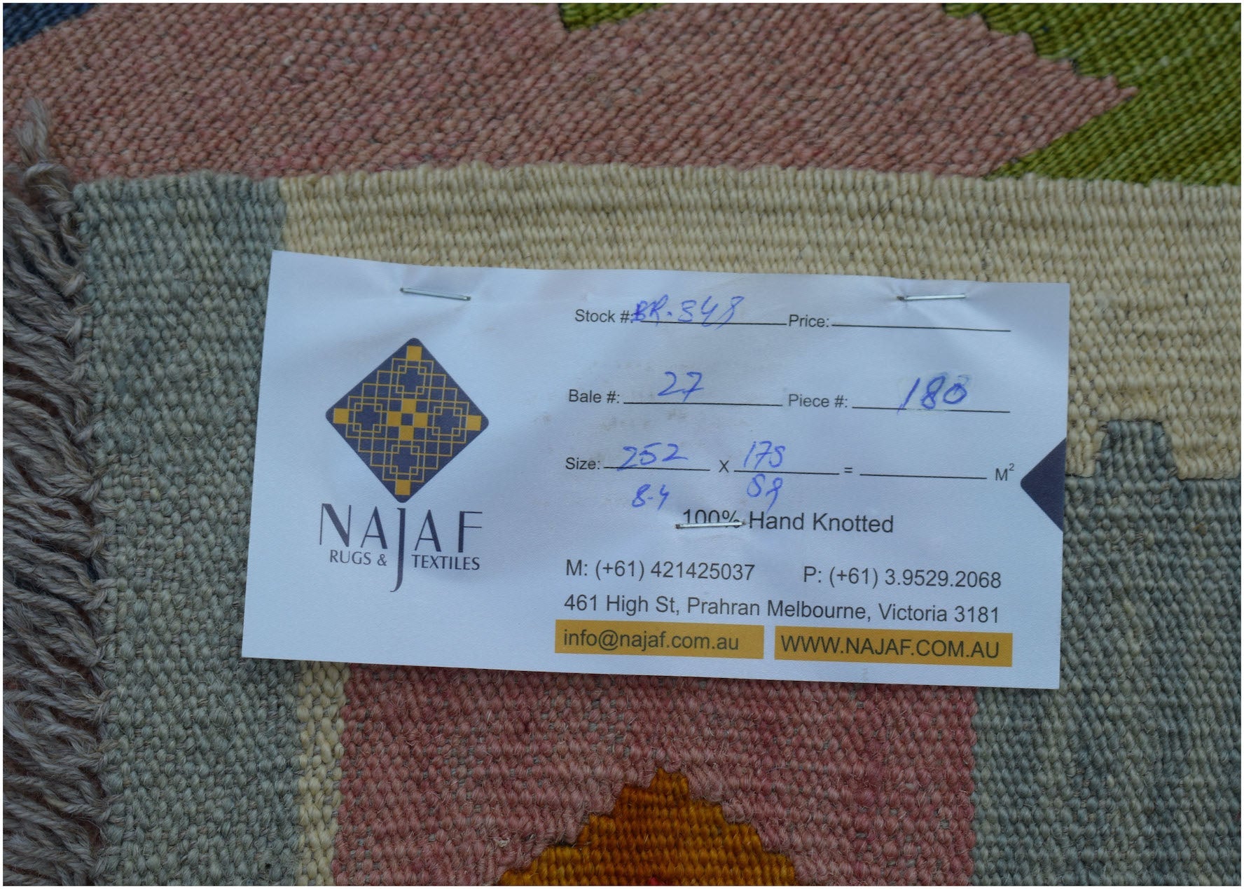 An Afghan Maimana kilim rug featuring a geometric pattern in wool with a flatweave texture.