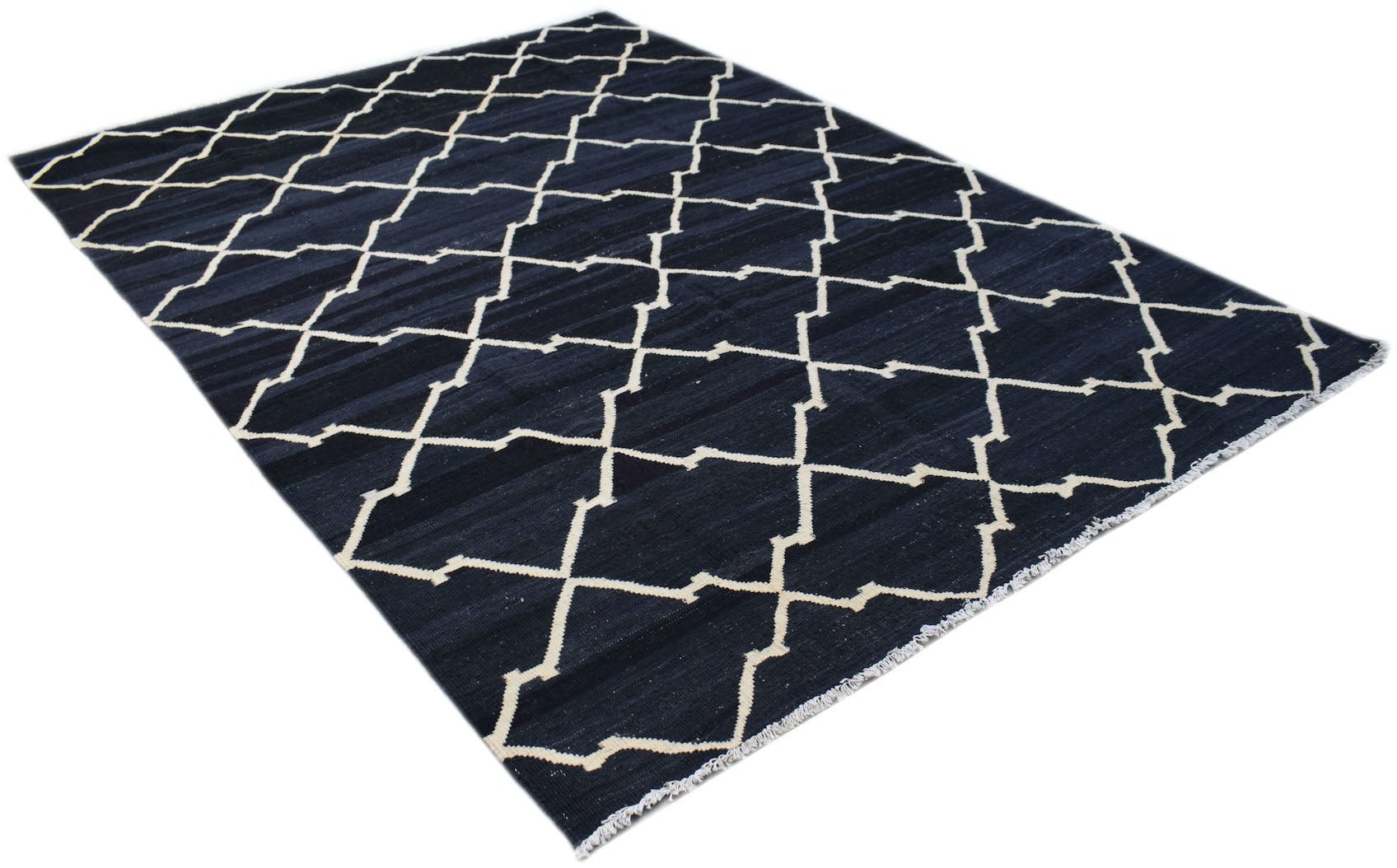 A handmade Afghan Maimana kilim rug featuring a dark blue field with a white geometric lattice.