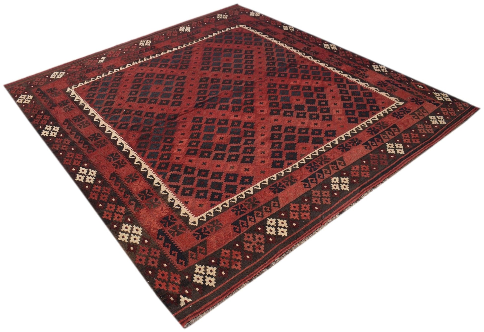 A handmade Afghan Maimana kilim rug featuring a geometric diamond pattern in red and black wool.