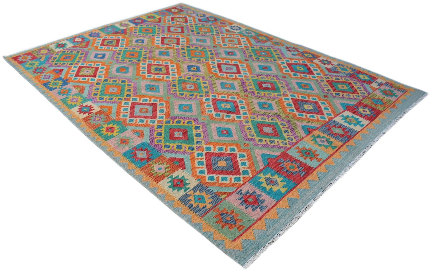 Handmade Afghan Maimana kilim rug featuring a vibrant geometric pattern in wool.