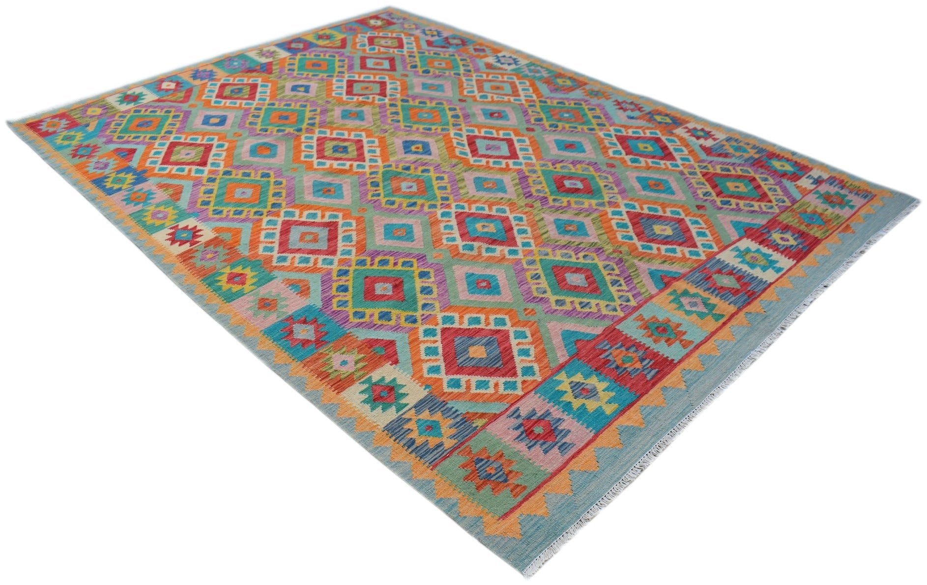 Handmade Afghan Maimana kilim rug featuring a vibrant geometric pattern in wool.