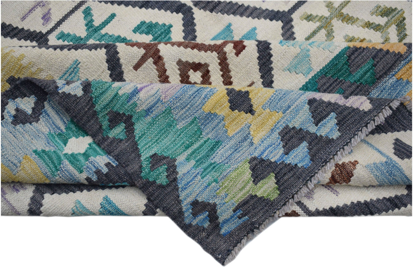 A handwoven Afghan Maimana kilim rug featuring a colorful geometric pattern on a cream background.