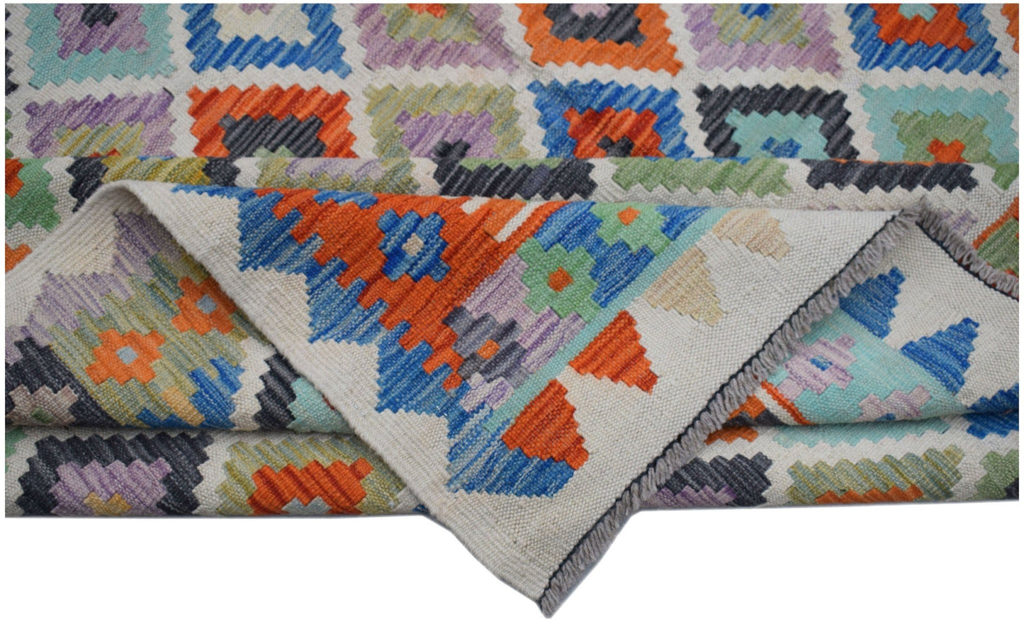 Handwoven Afghan Maimana kilim rug featuring a colorful geometric pattern on a flatweave wool base.
