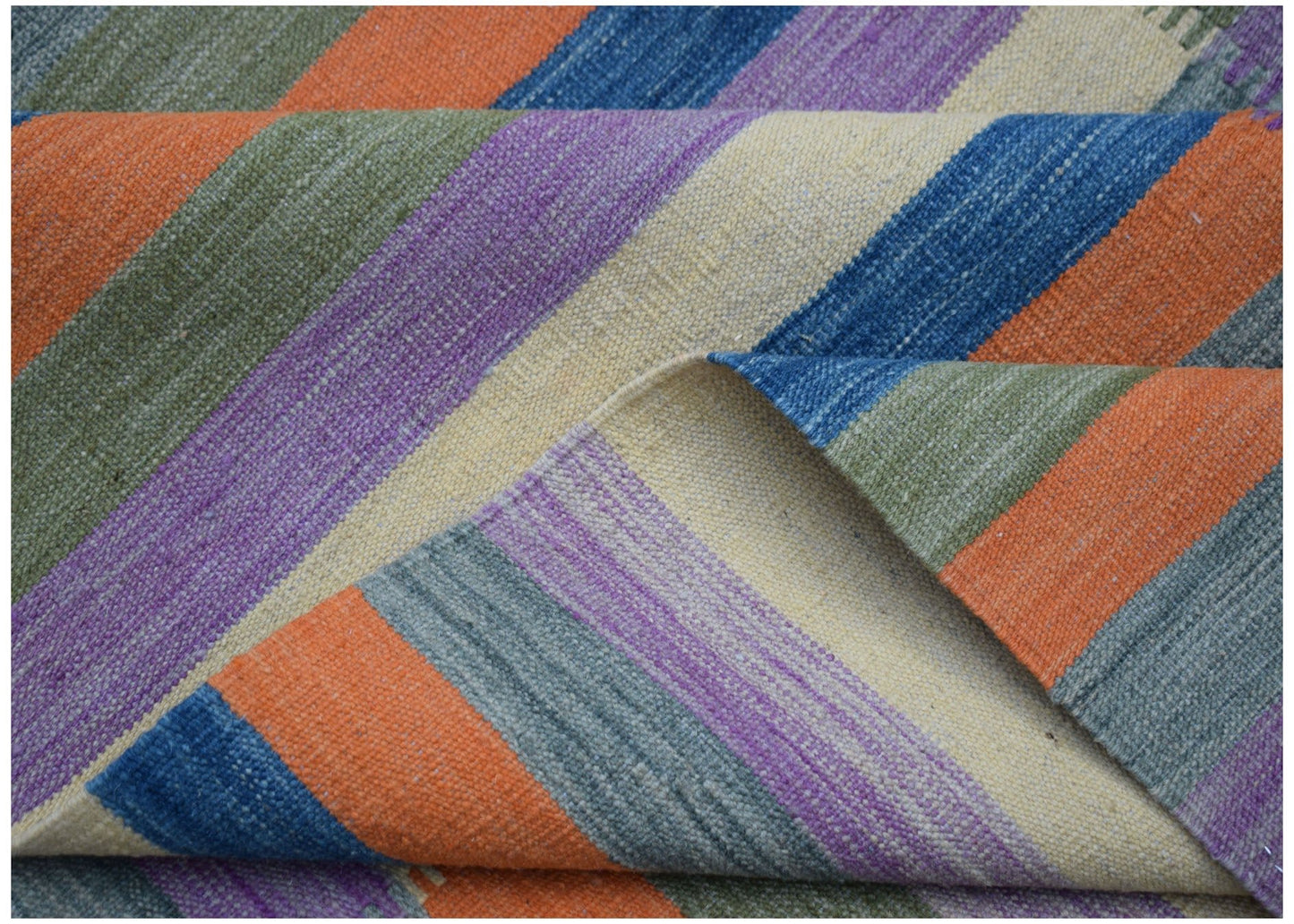 Handwoven Afghan Maimana kilim rug featuring a vibrant striped pattern in wool.