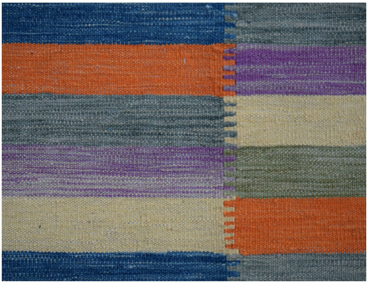 Handwoven Afghan Maimana kilim featuring a flat-weave texture with colorful horizontal stripes.