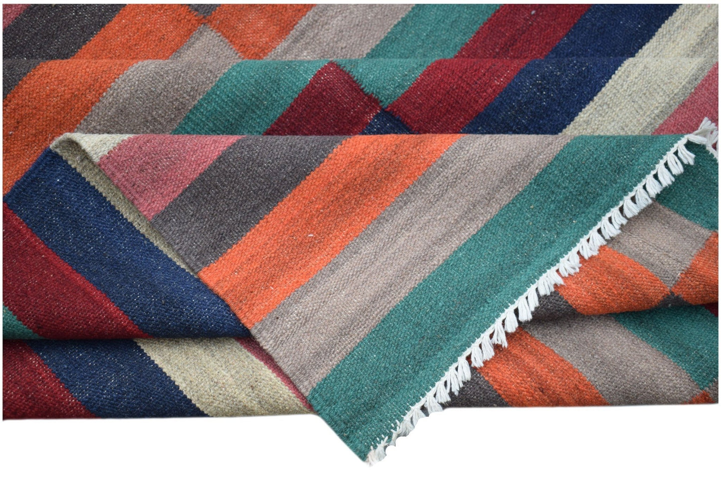 A handmade Afghan Maimana kilim rug featuring a vibrant, multicolored striped geometric pattern.