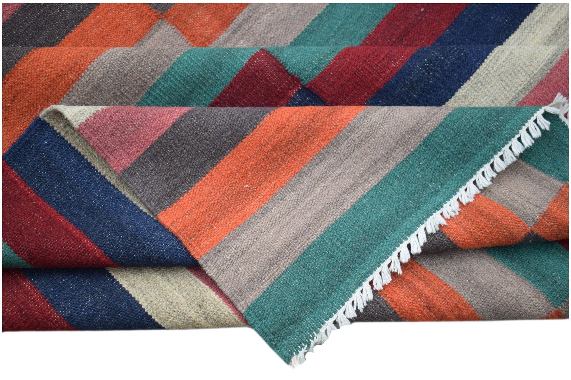 A handmade Afghan Maimana kilim rug featuring a vibrant, multicolored striped geometric pattern.