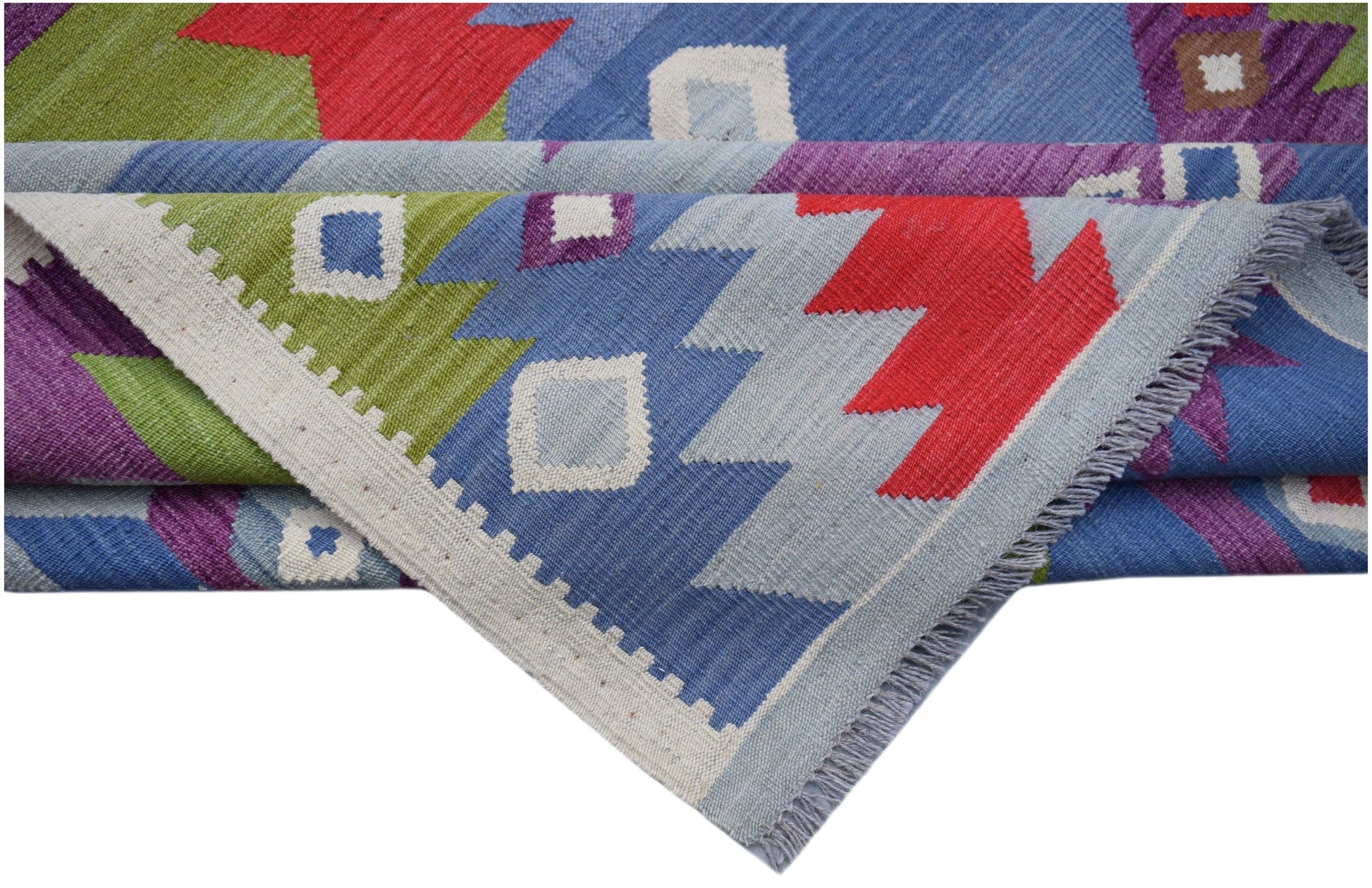 A handmade Afghan Maimana kilim rug featuring vibrant geometric patterns in wool.