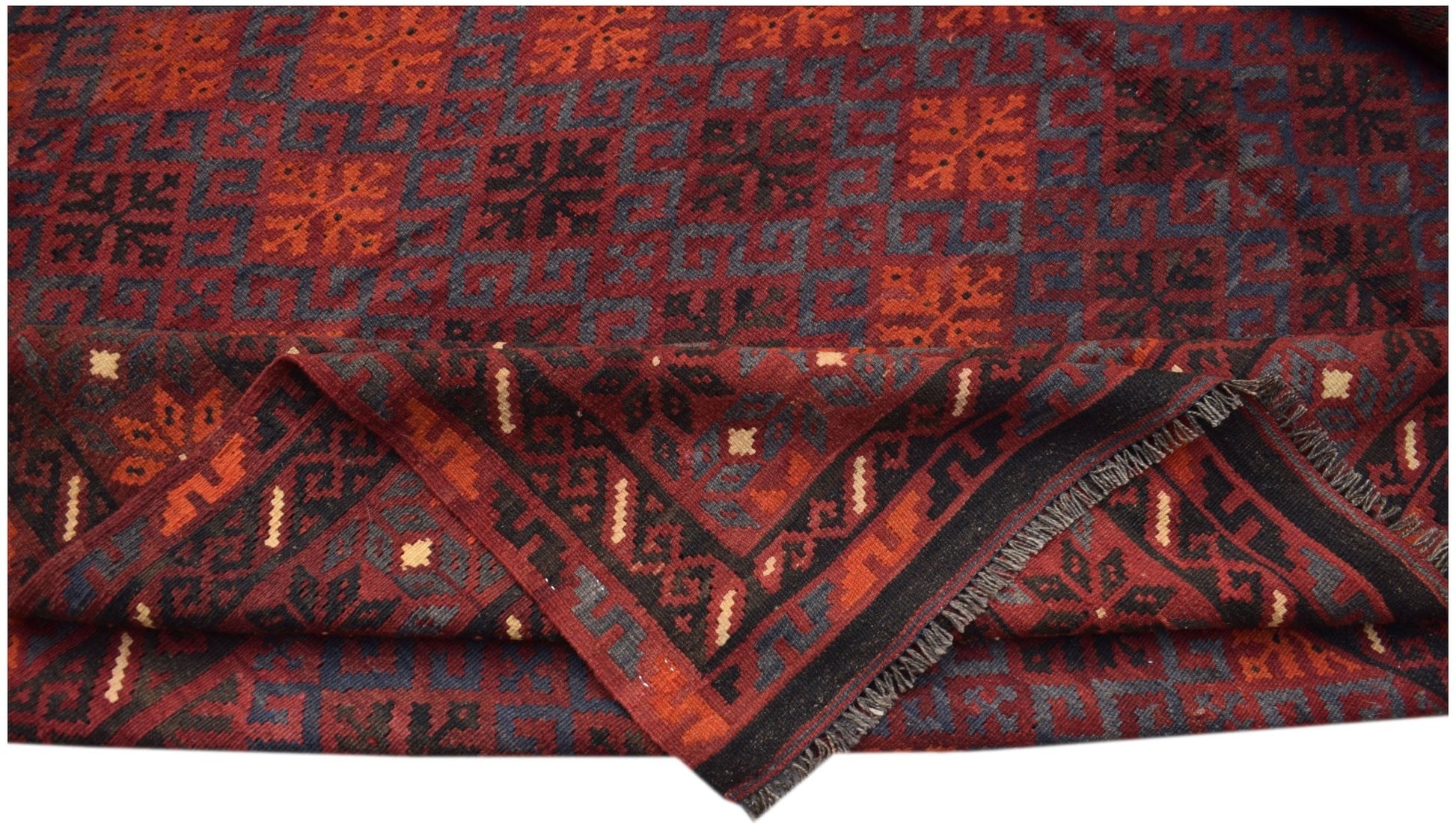 Handwoven Afghan Maimana kilim featuring a geometric pattern in deep red and dark blue wool.