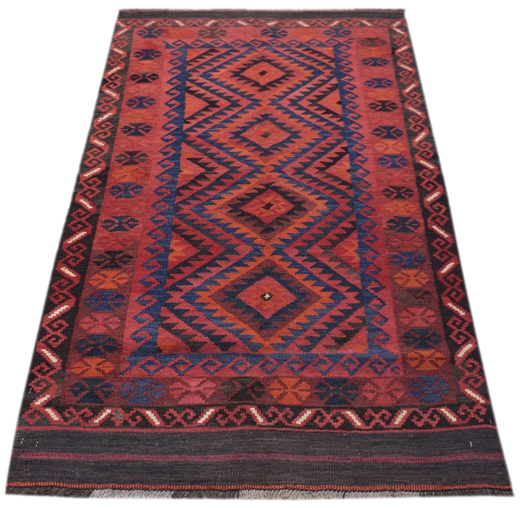 Handwoven Afghan Maimana wool runner featuring a geometric diamond pattern in red and blue.