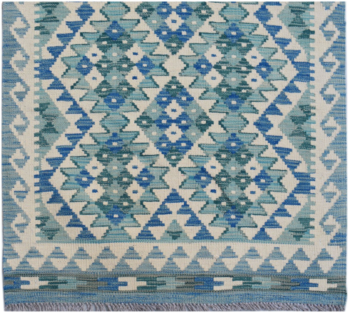 Handwoven Afghan Maimana wool runner featuring a geometric pattern in shades of blue and cream.