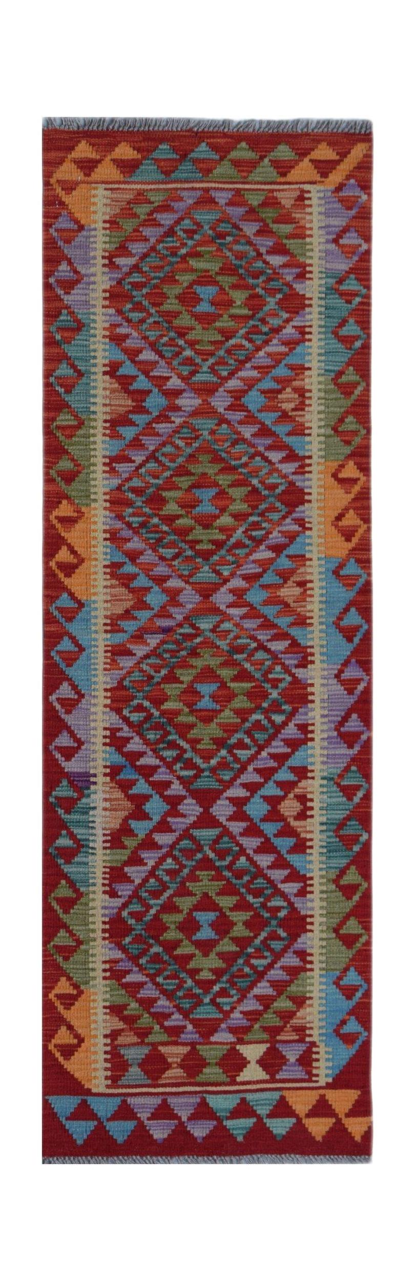 Handwoven Afghan Maimana wool runner rug featuring a vibrant geometric diamond pattern.