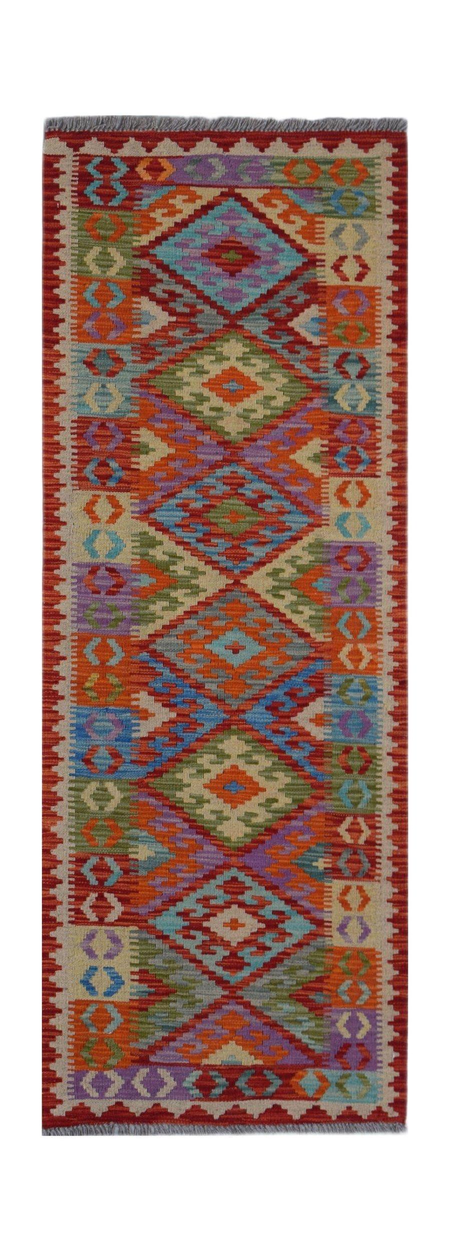 Handwoven Afghan Maimana wool runner rug featuring a colorful geometric diamond pattern.