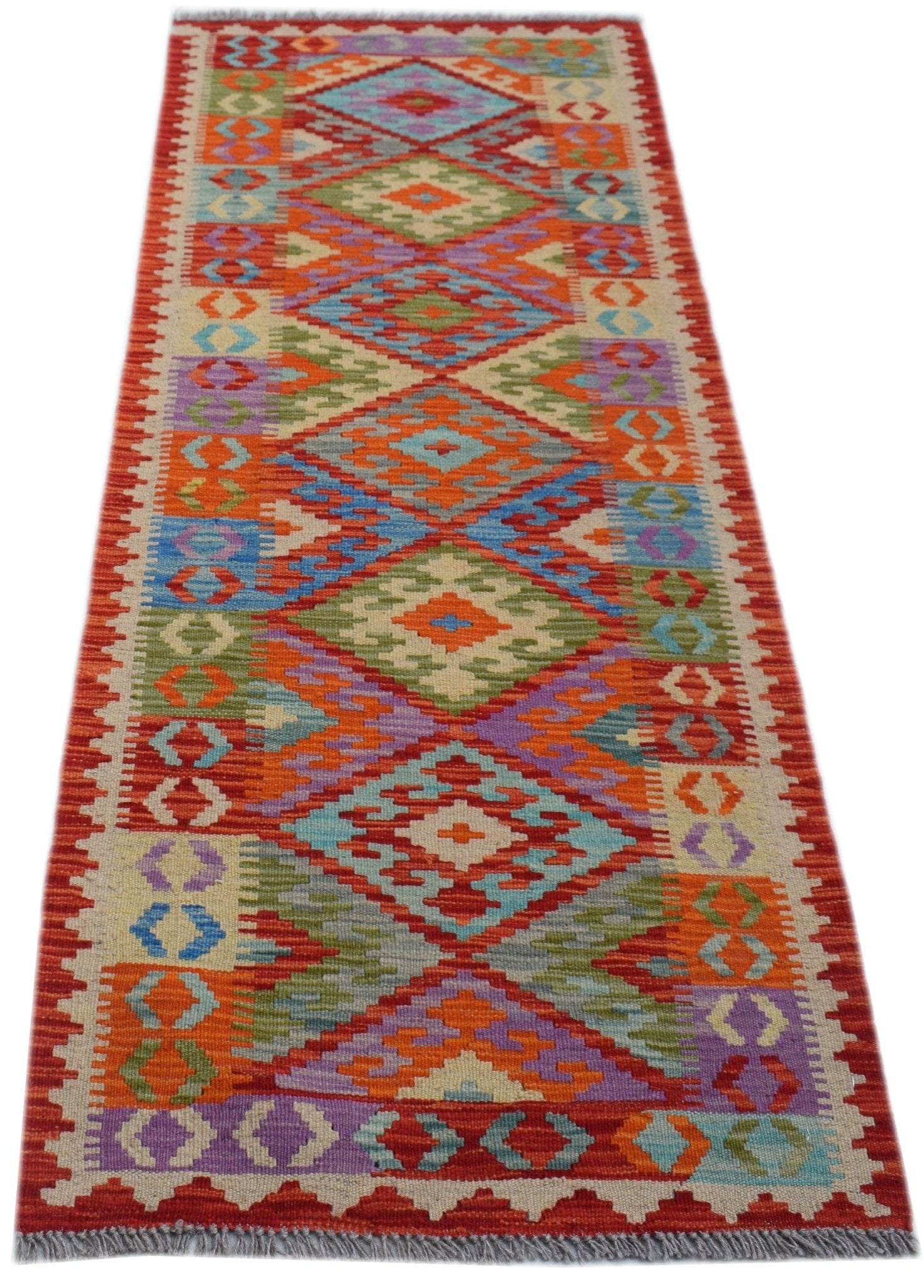 Handwoven Afghan Maimana wool runner rug featuring a vibrant geometric diamond pattern.