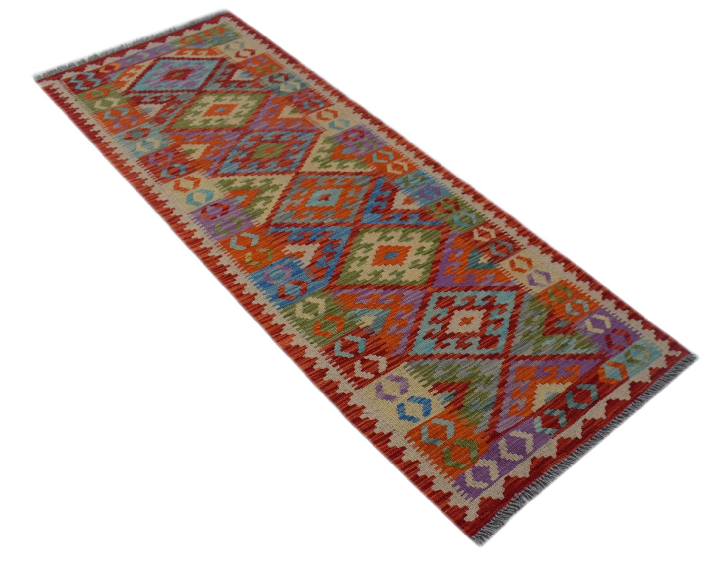 Handwoven Afghan Maimana wool runner rug featuring a colorful geometric diamond pattern.