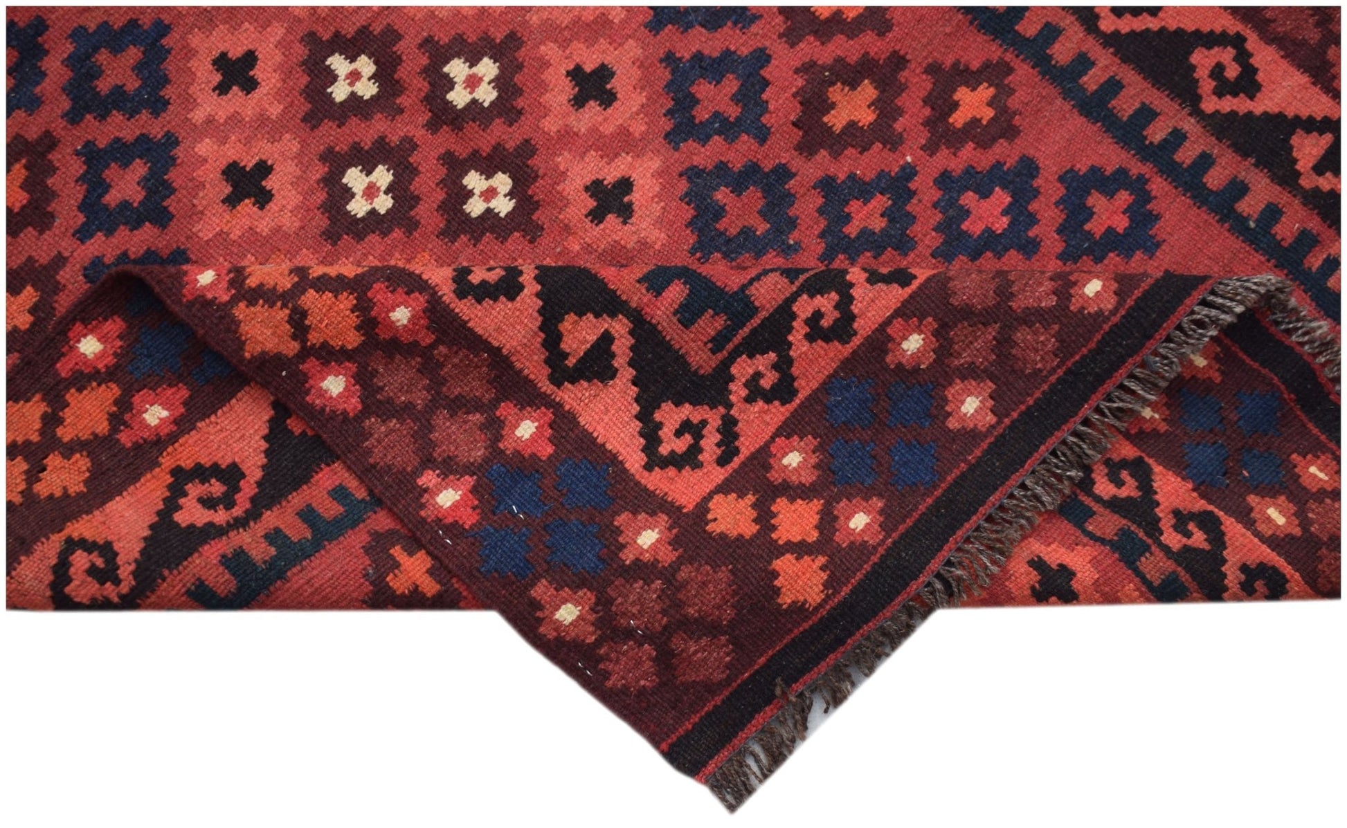Handwoven Afghan Maimana kilim runner featuring a geometric pattern in red, blue, and cream wool.