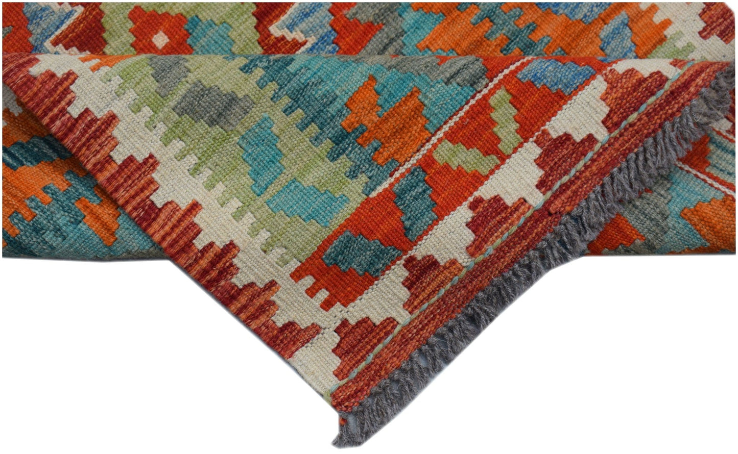 Handwoven Afghan Maimana wool kilim runner featuring a geometric pattern in vibrant colors.