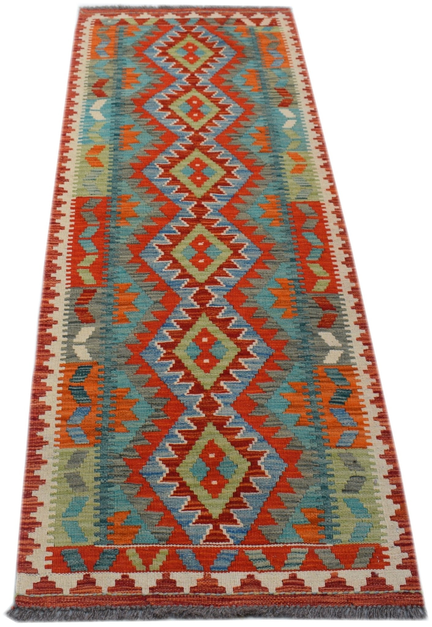 A handmade Afghan Maimana wool runner rug featuring a vibrant geometric diamond pattern.