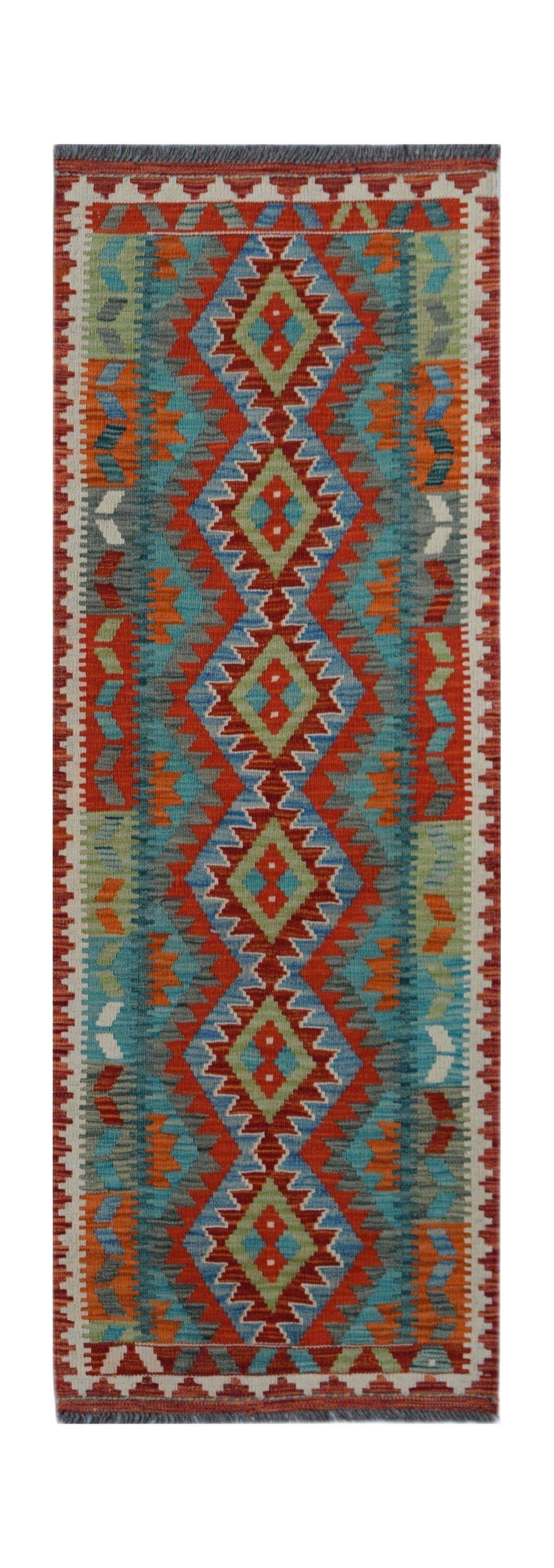Handwoven Afghan Maimana wool runner featuring a vibrant geometric diamond pattern.
