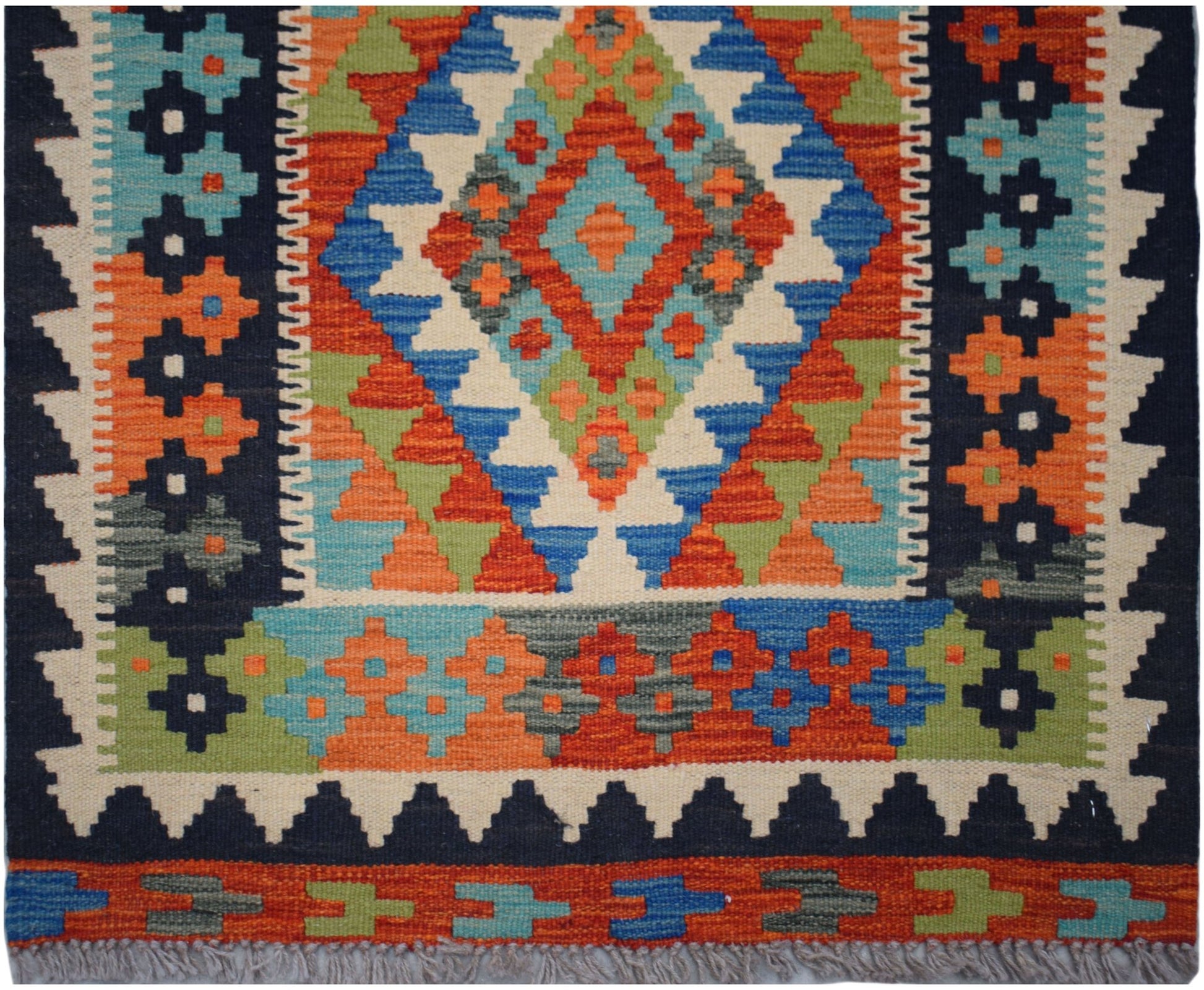 Handwoven Afghan Maimana wool runner featuring a vibrant geometric diamond pattern.