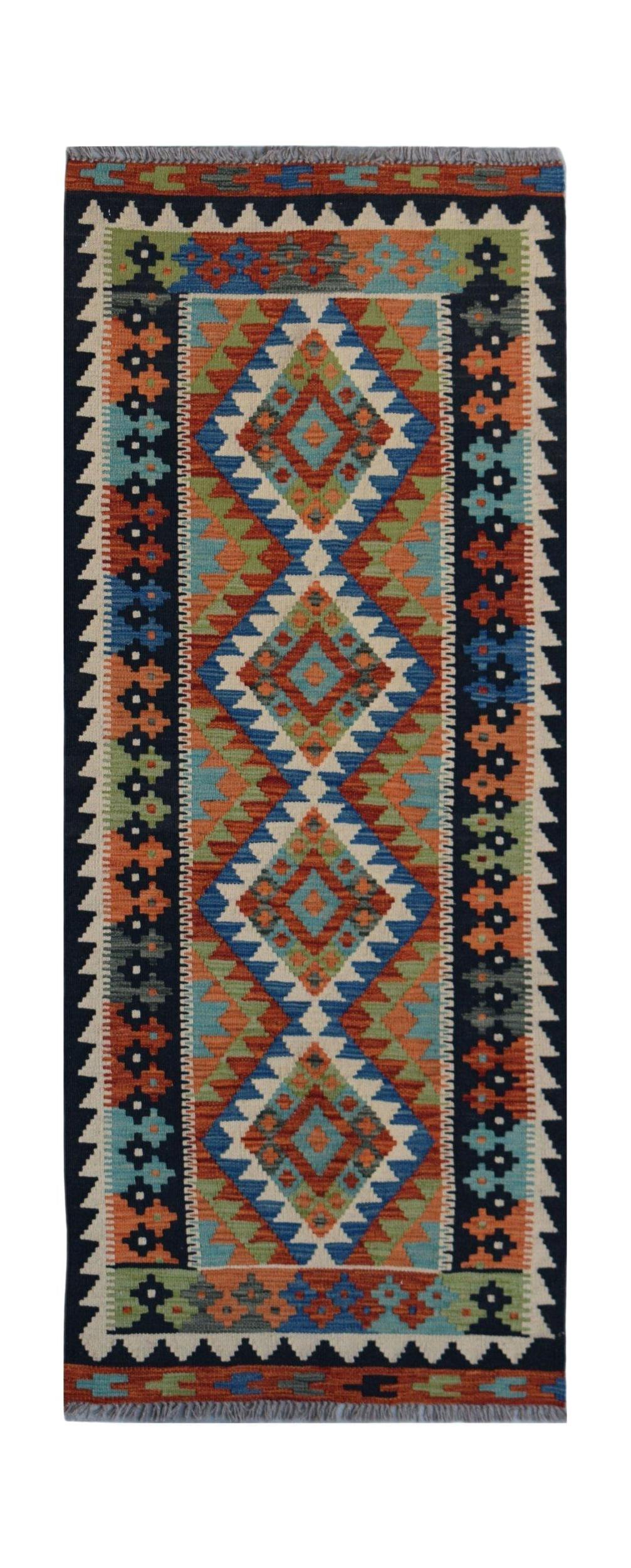 Handwoven Afghan Maimana wool runner rug featuring a colorful geometric diamond pattern.
